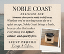 Product description card for Noble Coast that says "Designed for moments when you're ready to drift away. Whether you're craving ocean air or a quiet escape, Noble Coast brings a fresh, breezy calm that makes everything lighter, calmer, and quietly free." with a scent profile of "Crisp & Clean"