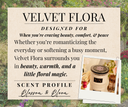 Product description card for Velvet Flora that says "Designed for when you're craving beauty, comfort, & peace. Whether you're romanticizing the everyday or softening a busy moment, Velvet Flora surrounds you in beauty, warmth, and a little floral magic." with a scent profile of "Blossom & Bloom'