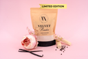 Package of Velvet Powder with vanilla beans and flowers on a pink background