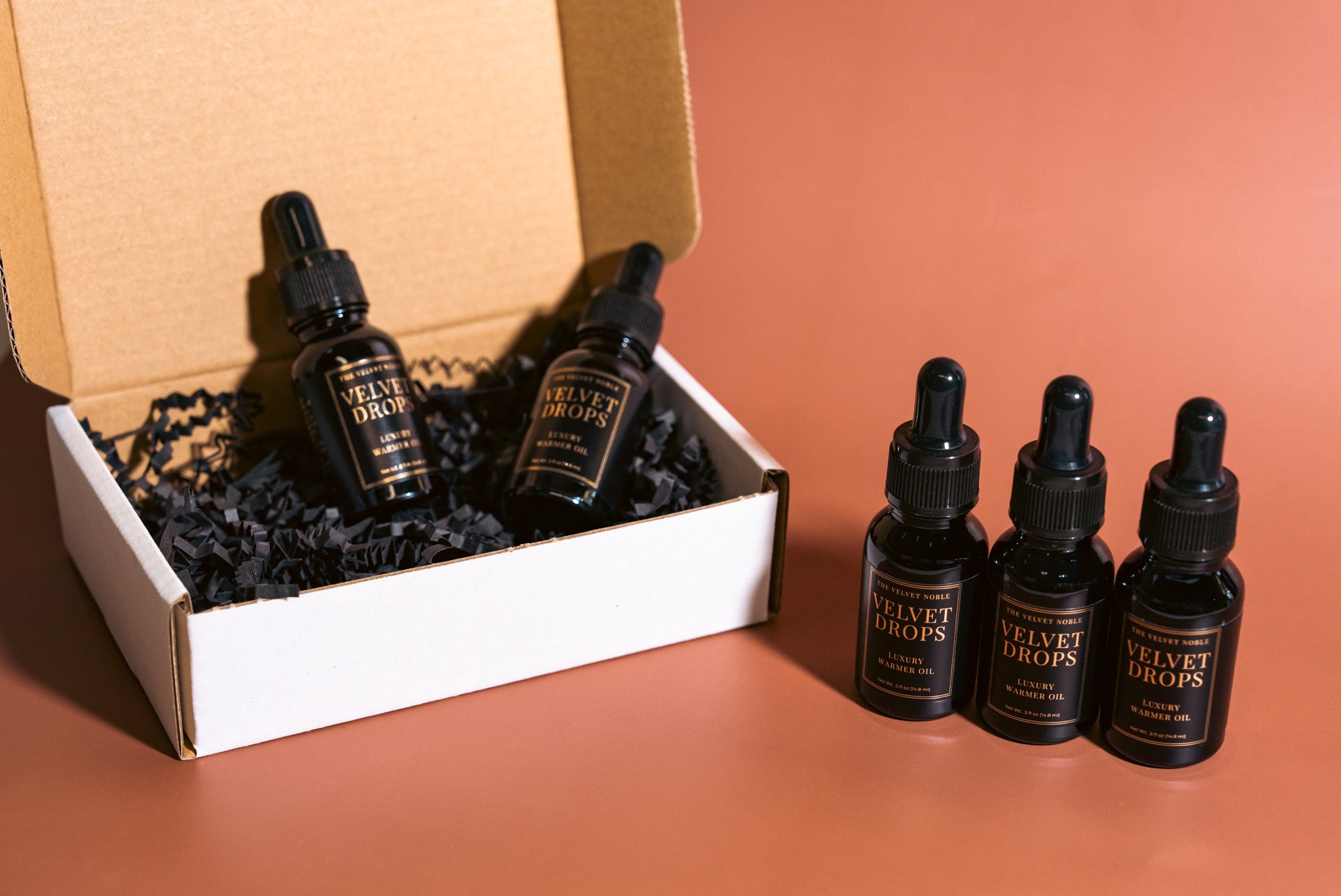 Velvet Drops discovery set on a neutral background with packaging.