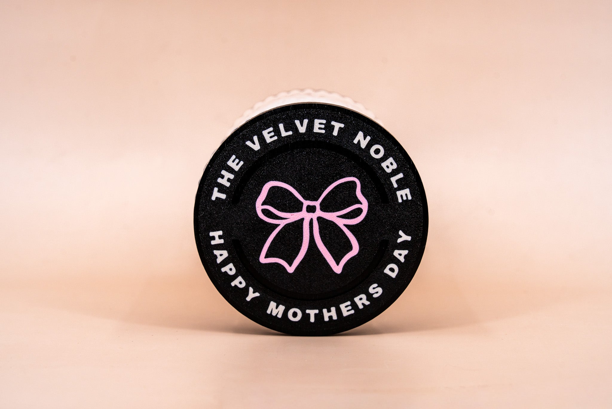 Black candle Lid with a pink bow that says "Happy Mothers Day"