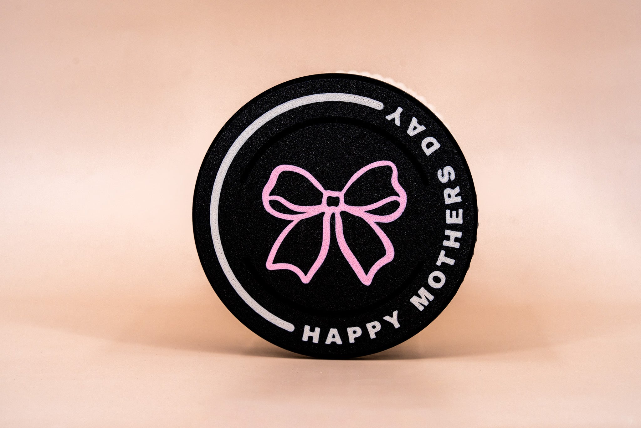 Black candle Lid with a pink bow that says "Happy Mothers Day"
