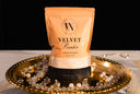 Package of Velvet Powder on a decorative tray with crystals