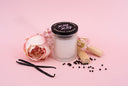 Sugared Legacy on a pink background with Sandalwood, Black Pepper Peony, and Vanilla