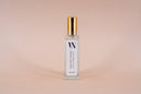 Mini Air & Linen Mist Bottle on a beige background
